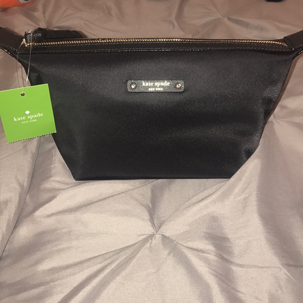 Never used Kate spade cosmetic bag